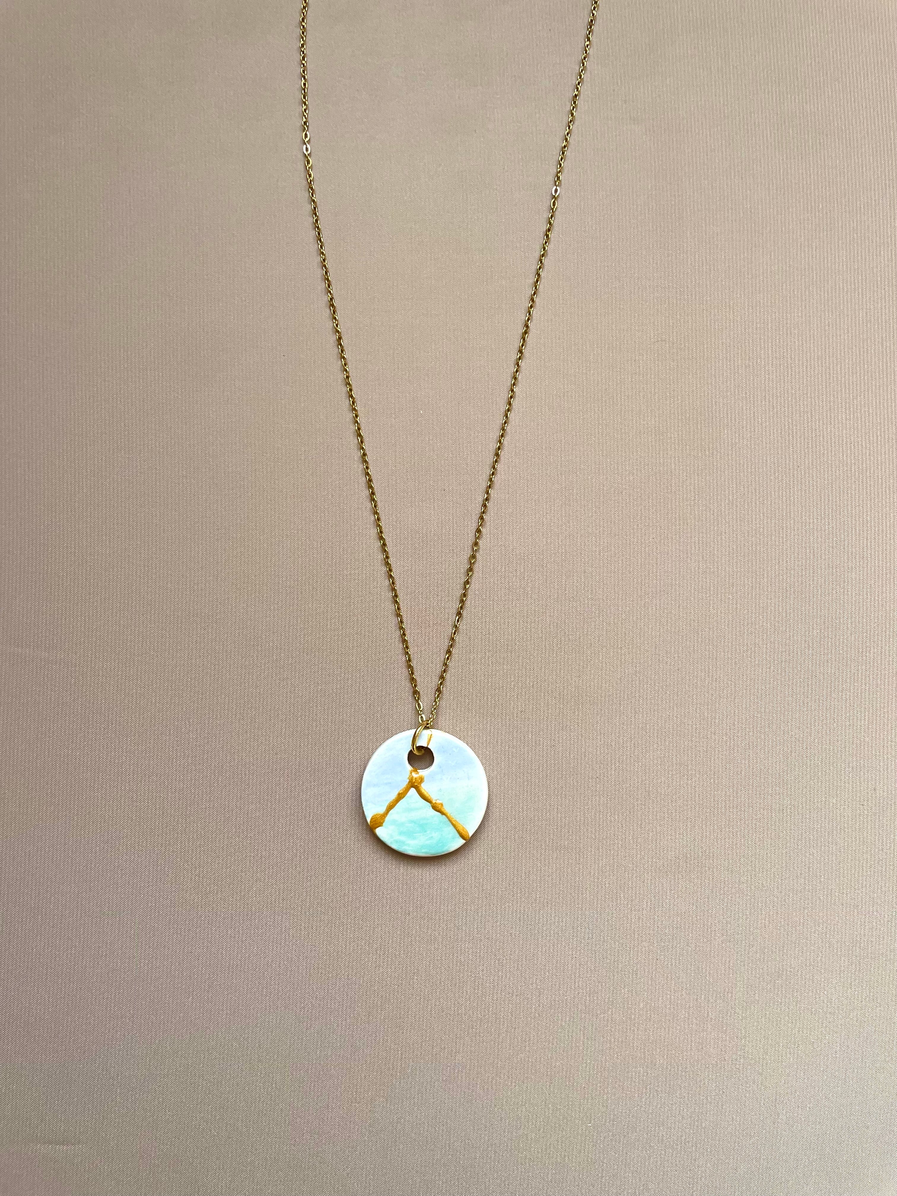 Colgante redondo de mar y cielo, con kintsugi