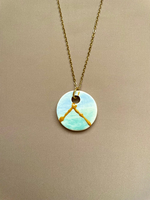 Colgante redondo de mar y cielo, con kintsugi